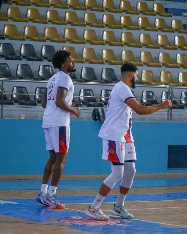 Basketball players warming up